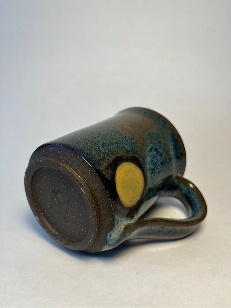 blue and yellow mug