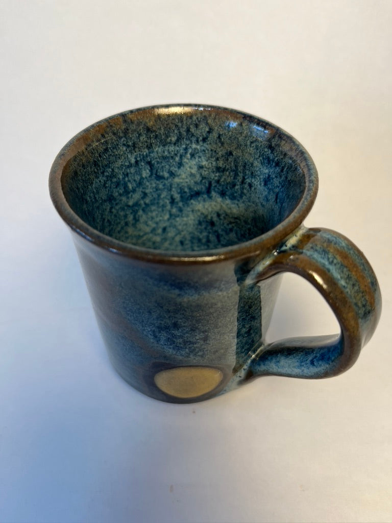 blue and yellow mug